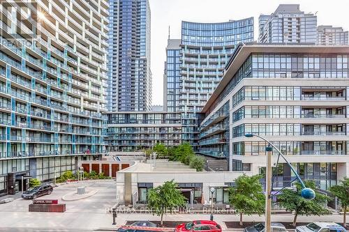 301 - 10 Capreol Court, Toronto, ON - Outdoor With Balcony With Facade