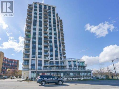 907 - 840 Queens Plate Drive, Toronto, ON - Outdoor With Balcony With Facade