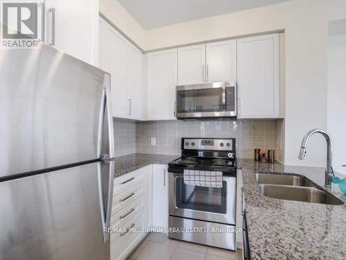 907 - 840 Queens Plate Drive, Toronto, ON - Indoor Photo Showing Kitchen With Double Sink With Upgraded Kitchen