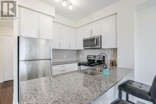 907 - 840 Queens Plate Drive, Toronto, ON - Indoor Photo Showing Kitchen With Double Sink With Upgraded Kitchen