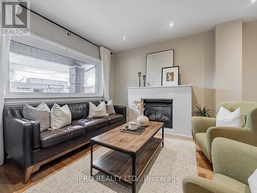 358 Sammon Avenue, Toronto, ON - Indoor Photo Showing Living Room With Fireplace