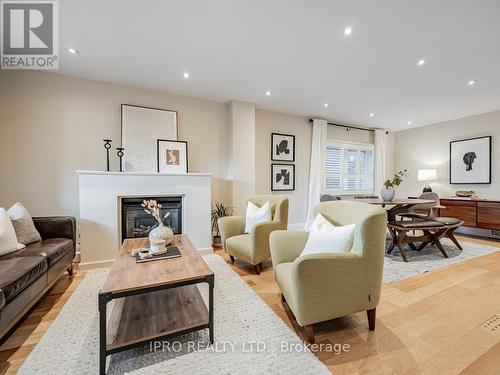 358 Sammon Avenue, Toronto, ON - Indoor Photo Showing Living Room With Fireplace