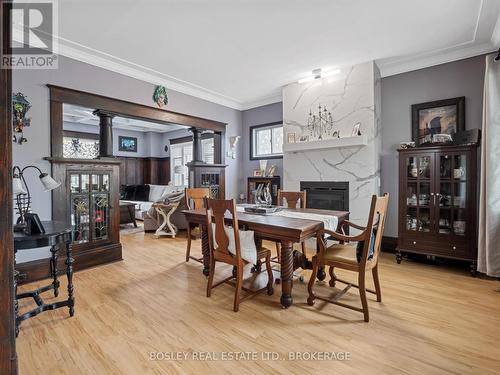 176 Russell Avenue, St. Catharines (451 - Downtown), ON - Indoor Photo Showing Dining Room With Fireplace