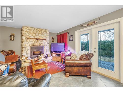 15902 Prairie Valley Road, Summerland, BC - Indoor Photo Showing Living Room With Fireplace