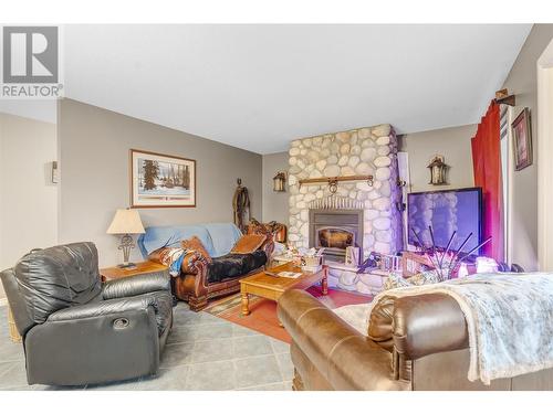 15902 Prairie Valley Road, Summerland, BC - Indoor Photo Showing Living Room With Fireplace