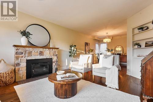 91 Riverside Drive S, Oshawa (Donevan), ON - Indoor Photo Showing Living Room With Fireplace