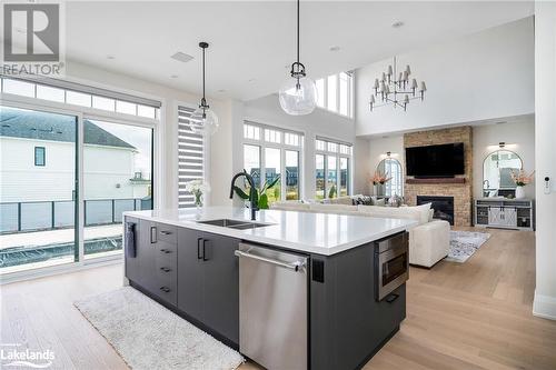 103 Springside Crescent, The Blue Mountains, ON - Indoor Photo Showing Kitchen With Fireplace With Double Sink With Upgraded Kitchen