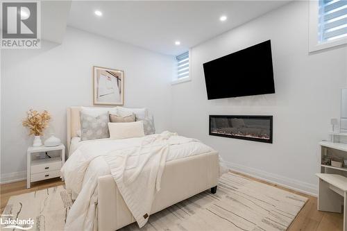 103 Springside Crescent, The Blue Mountains, ON - Indoor Photo Showing Bedroom With Fireplace