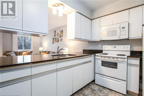 275 Eiwo Court Unit# 303, Waterloo, ON - Indoor Photo Showing Kitchen