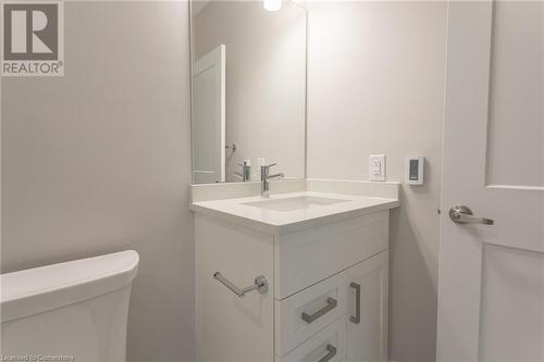 Bathroom with vanity and toilet - 460 Callaway Road Unit# 910, London, ON - Indoor Photo Showing Bathroom