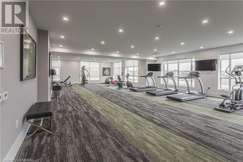 Workout area with carpet floors - 460 Callaway Road Unit# 910, London, ON - Indoor Photo Showing Gym Room