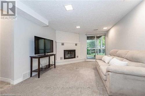 604 Glen Forrest Boulevard Unit# Basement, Waterloo, ON - Indoor Photo Showing Living Room With Fireplace