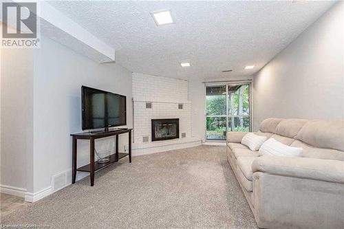 604 Glen Forrest Boulevard Unit# Upper, Waterloo, ON - Indoor Photo Showing Living Room With Fireplace