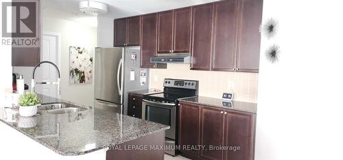 305 - 8026 Kipling Avenue W, Vaughan, ON - Indoor Photo Showing Kitchen With Stainless Steel Kitchen With Upgraded Kitchen