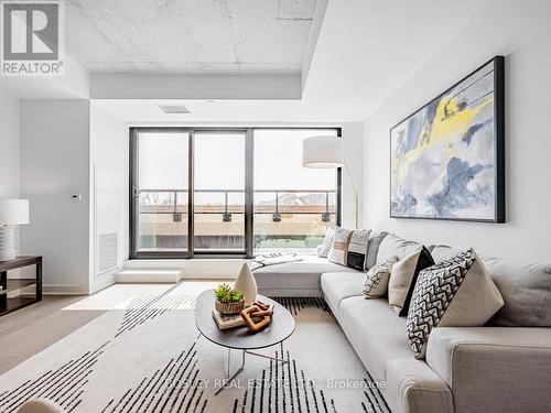 406 - 2720 Dundas Street W, Toronto, ON - Indoor Photo Showing Living Room