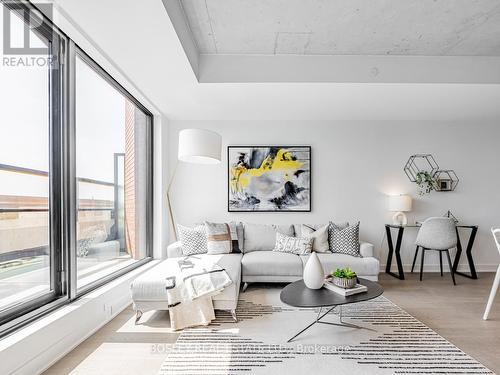 406 - 2720 Dundas Street W, Toronto, ON - Indoor Photo Showing Living Room