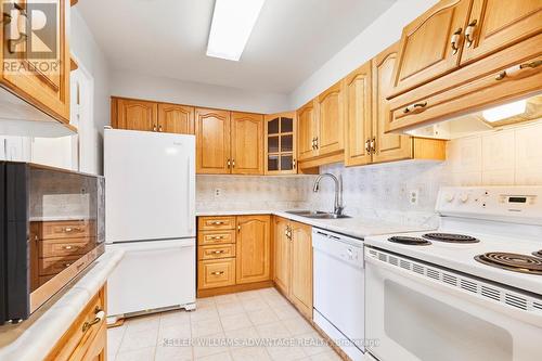 1503 - 1580 Mississ Vly Boulevard, Mississauga, ON - Indoor Photo Showing Kitchen With Double Sink