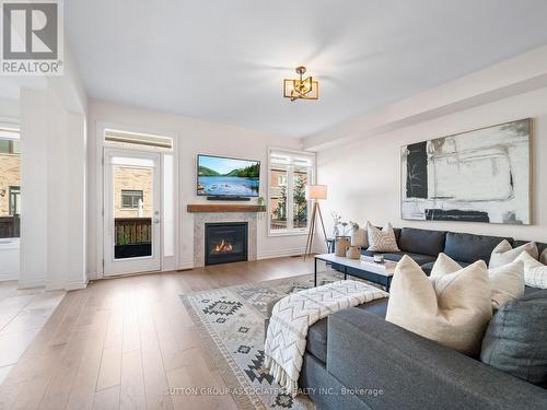 1166 Raspberry Terrace, Milton, ON - Indoor Photo Showing Living Room With Fireplace