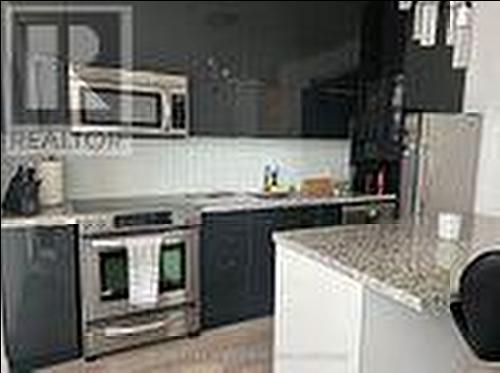 426 - 80 Marine Parade Drive, Toronto, ON - Indoor Photo Showing Kitchen