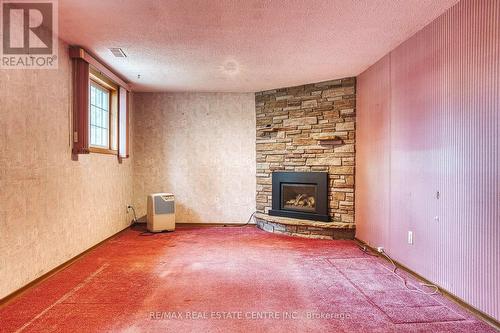 272 John Street, Centre Wellington, ON - Indoor Photo Showing Living Room With Fireplace