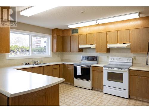 2085 Gordon Drive Unit# 312, Kelowna, BC - Indoor Photo Showing Kitchen With Double Sink