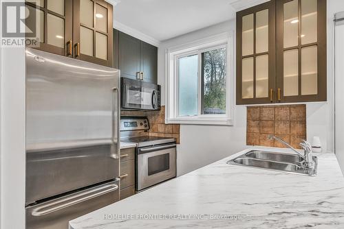 354 Laird Drive, Toronto, ON - Indoor Photo Showing Kitchen With Double Sink