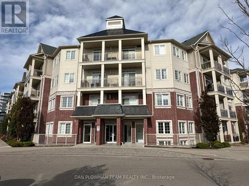 320 - 84 Aspen Springs Drive, Clarington, ON - Outdoor With Balcony With Facade