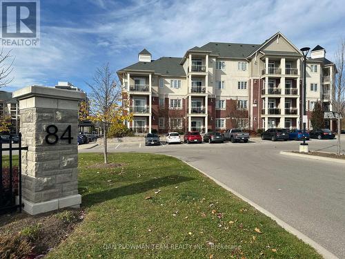 320 - 84 Aspen Springs Drive, Clarington, ON - Outdoor With Balcony With Facade