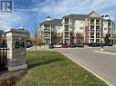 320 - 84 Aspen Springs Drive, Clarington, ON  - Outdoor With Balcony With Facade 