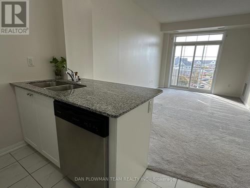 320 - 84 Aspen Springs Drive, Clarington, ON - Indoor Photo Showing Kitchen With Double Sink