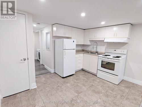 Bsmt - 158 Coxwell Avenue, Toronto, ON - Indoor Photo Showing Kitchen With Double Sink