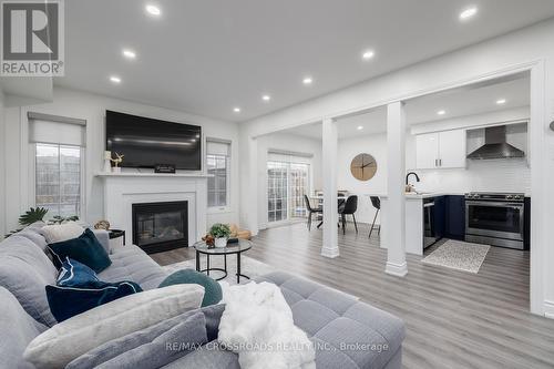 16 Gallimere Court, Whitby, ON - Indoor Photo Showing Living Room With Fireplace