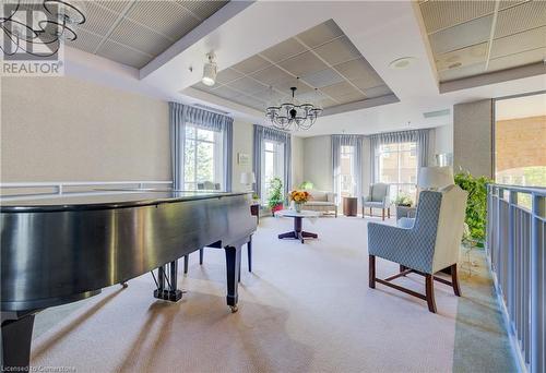 Piano room to greet your guests as they enter the building - 1414 King Street E Unit# 1106, Kitchener, ON - Indoor Photo Showing Other Room