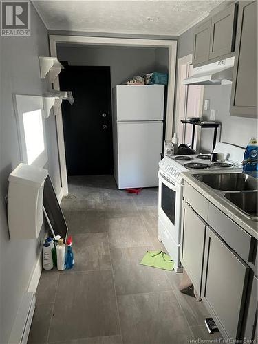 103-105 Hazen Street, Saint John, NB - Indoor Photo Showing Kitchen With Double Sink