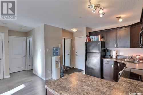 102 1501 15Th Street E, Prince Albert, SK - Indoor Photo Showing Kitchen With Double Sink