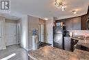 102 1501 15Th Street E, Prince Albert, SK  - Indoor Photo Showing Kitchen With Double Sink 