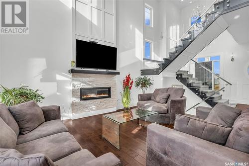 702 Bolstad Turn, Saskatoon, SK - Indoor Photo Showing Living Room With Fireplace