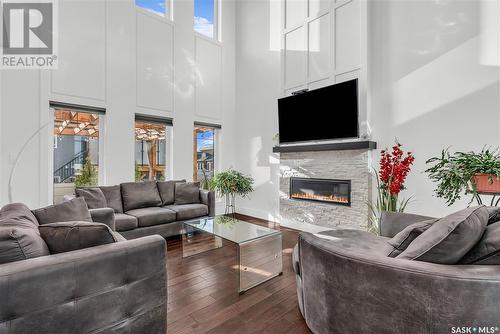 702 Bolstad Turn, Saskatoon, SK - Indoor Photo Showing Living Room With Fireplace