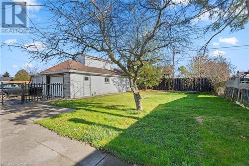 View of yard with a garage and an outdoor structure - 515 Deere Street, Welland, ON - Outdoor