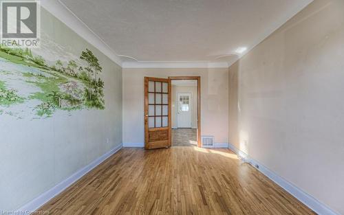 Unfurnished room with hardwood / wood-style flooring - 55 Ellis Avenue, Kitchener, ON - Indoor Photo Showing Other Room