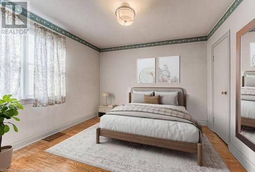 Bedroom with hardwood / wood-style flooring - 55 Ellis Avenue, Kitchener, ON - Indoor Photo Showing Bedroom