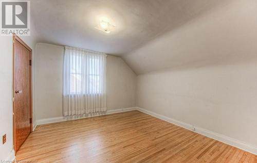 Bonus room featuring lofted ceiling and light hardwood / wood-style flooring - 55 Ellis Avenue, Kitchener, ON - Indoor Photo Showing Other Room