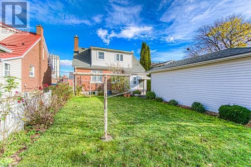 Back of house featuring a yard - 55 Ellis Avenue, Kitchener, ON - Outdoor