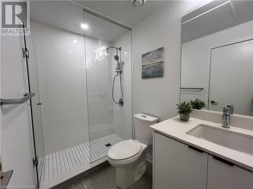 Bathroom featuring vanity, toilet, and walk in shower - 55 Duke Street W Unit# 1607, Kitchener, ON - Indoor Photo Showing Bathroom