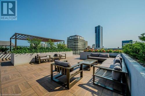 View of patio / terrace with a pergola and an outdoor hangout area - 55 Duke Street W Unit# 1607, Kitchener, ON - Outdoor