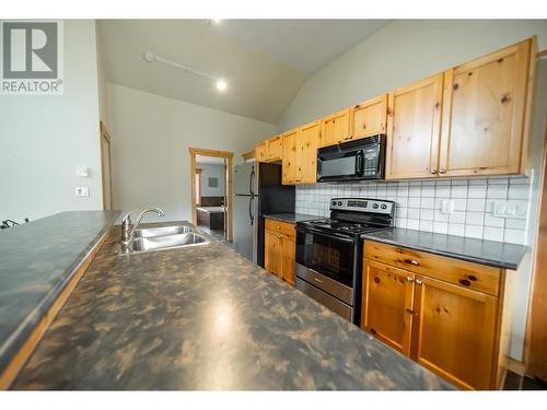 33 Rivermount Place Unit# 201D, Fernie, BC - Indoor Photo Showing Kitchen With Double Sink