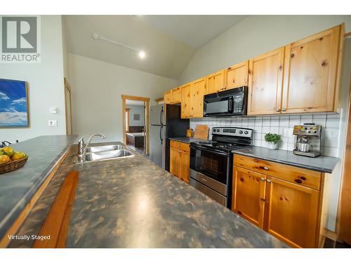 33 Rivermount Place Unit# 201D, Fernie, BC - Indoor Photo Showing Kitchen With Double Sink