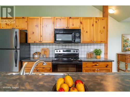 33 Rivermount Place Unit# 201D, Fernie, BC - Indoor Photo Showing Kitchen With Double Sink