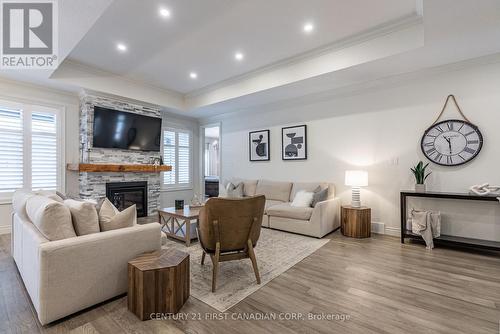 304 Thorn Drive, Strathroy-Caradoc (Ne), ON - Indoor Photo Showing Living Room With Fireplace