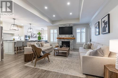 304 Thorn Drive, Strathroy-Caradoc (Ne), ON - Indoor Photo Showing Living Room With Fireplace